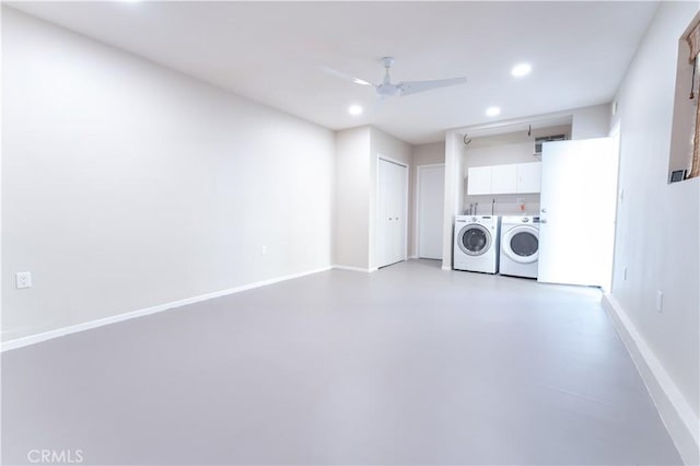 laundry room with washer and clothes dryer, ceiling fan, and cabinets