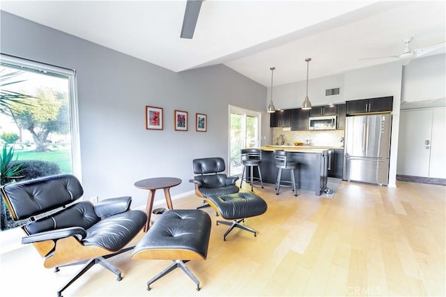 interior space with light hardwood / wood-style floors and ceiling fan