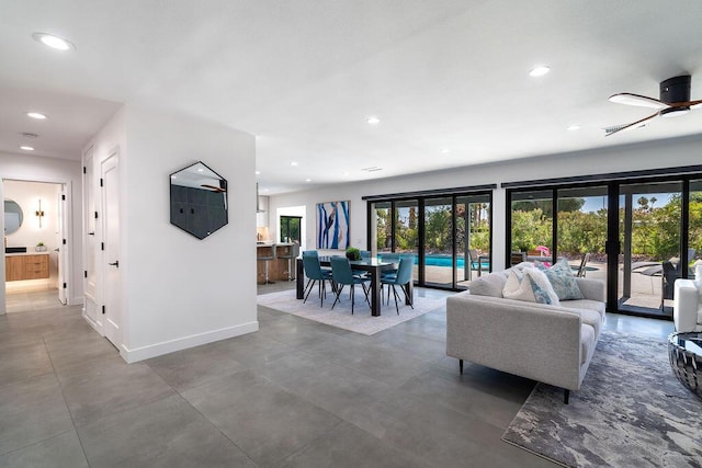 living room featuring ceiling fan