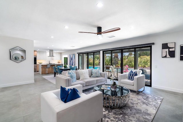 living room featuring ceiling fan