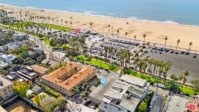 bird's eye view with a view of the beach and a water view