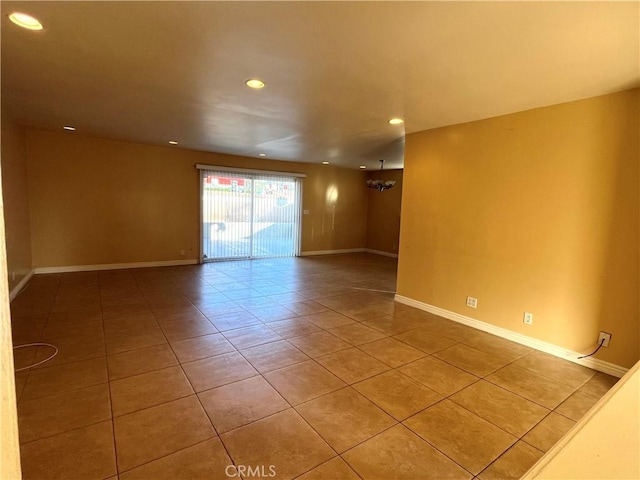 unfurnished room with tile patterned floors