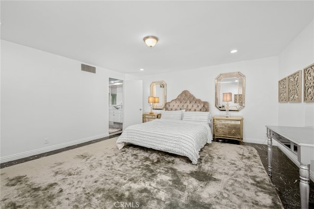 bedroom featuring ensuite bath