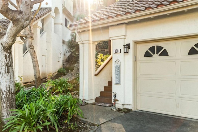 entrance to property with a garage