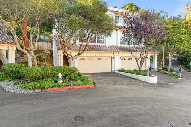 view of front of property featuring a garage