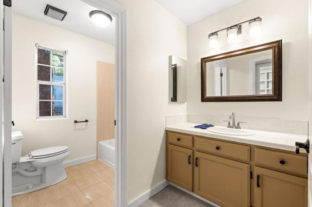 full bathroom featuring vanity, shower / washtub combination, tile patterned floors, and toilet