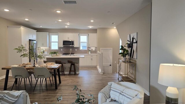 interior space featuring sink and hardwood / wood-style floors