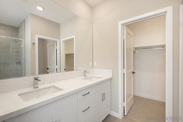 bathroom with walk in shower, vanity, and toilet