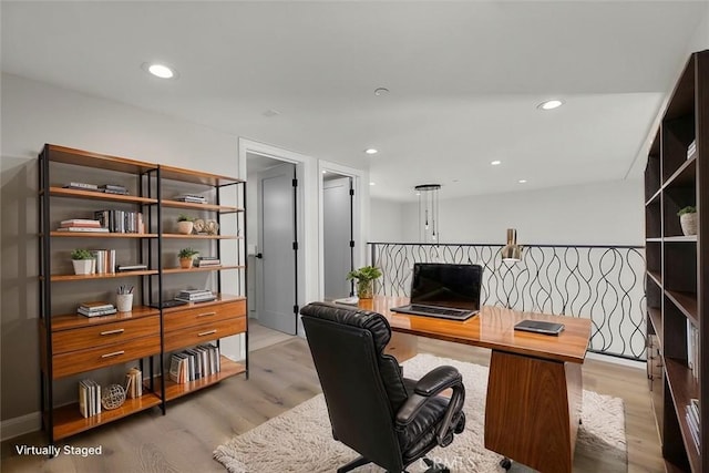 office space featuring light hardwood / wood-style floors