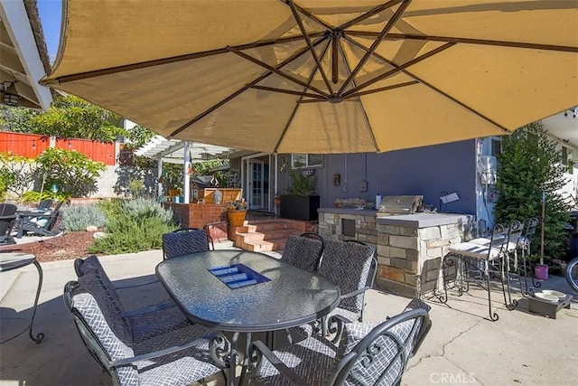 view of patio featuring area for grilling and grilling area