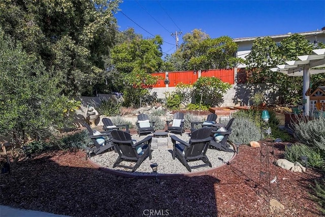 view of yard featuring a patio area and an outdoor fire pit