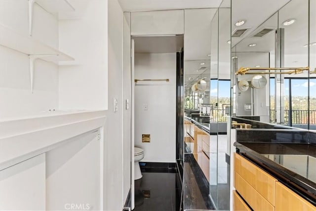 kitchen with white cabinets and light brown cabinetry