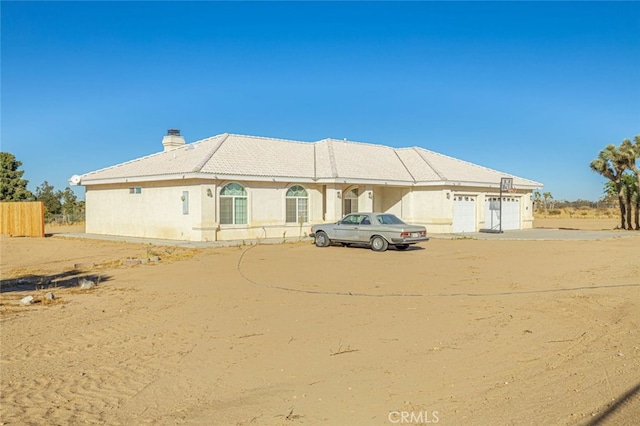 view of front of home with a garage