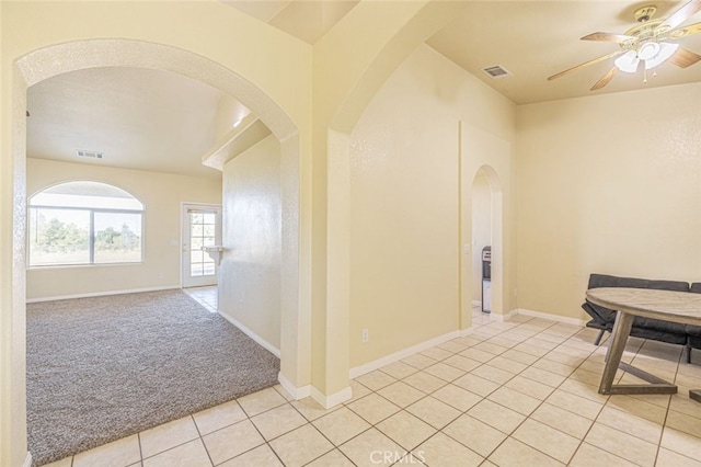 corridor with light colored carpet