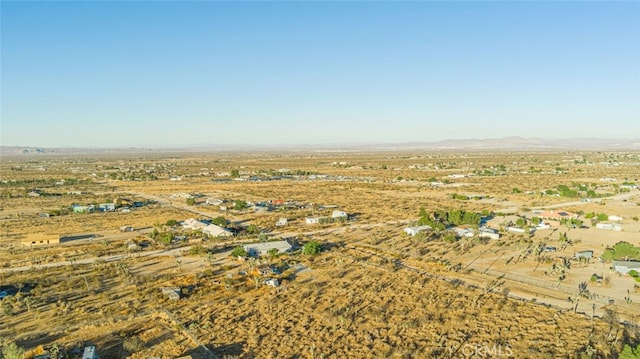 bird's eye view featuring a mountain view and a rural view