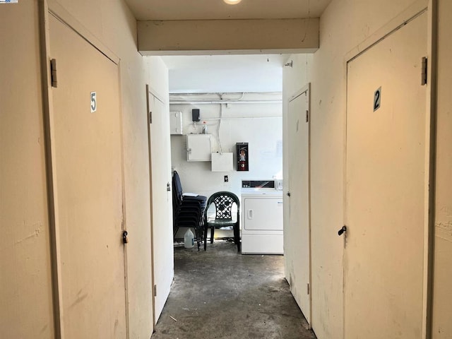 hallway featuring washer / dryer and electric panel