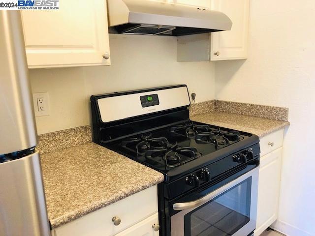 kitchen with white cabinets and stainless steel appliances