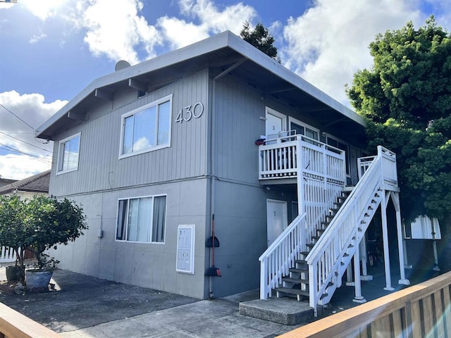 view of property exterior featuring a patio area