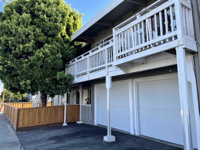 view of side of property with a garage