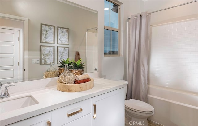 full bathroom featuring vanity, shower / tub combo, and toilet