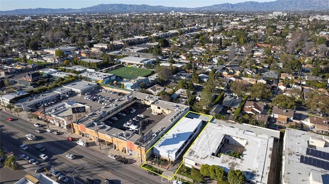 drone / aerial view featuring a mountain view