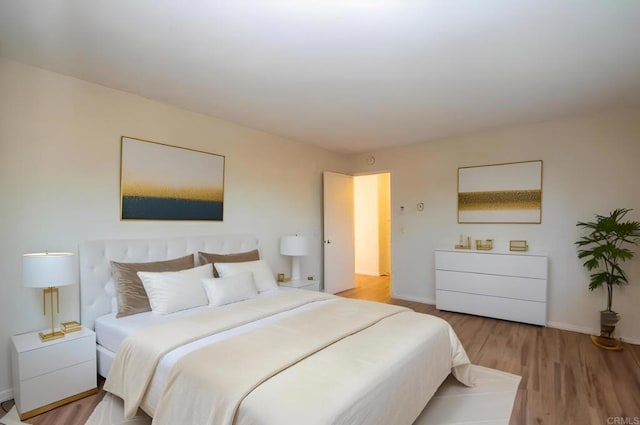 bedroom featuring light wood-type flooring