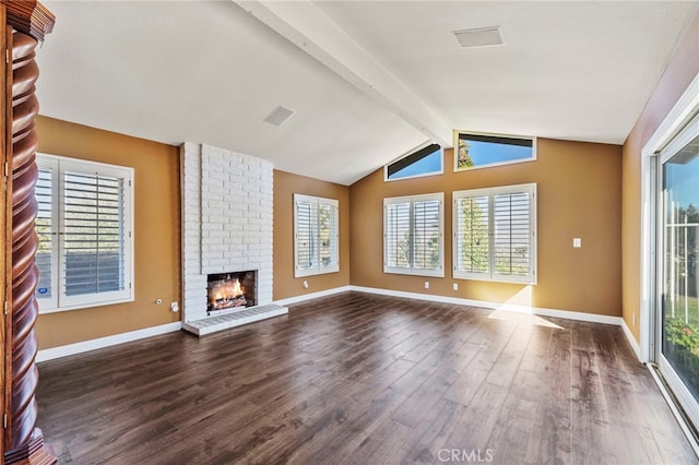 unfurnished living room with a fireplace, vaulted ceiling with beams, and dark wood-type flooring