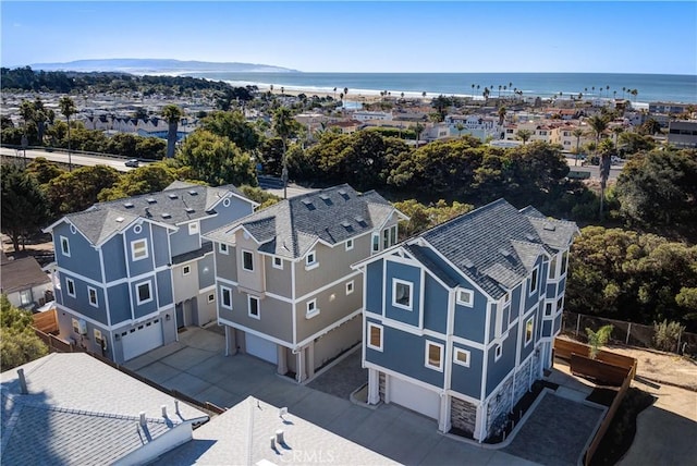 aerial view featuring a water view and a residential view