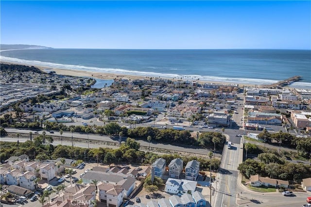 aerial view with a beach view and a water view