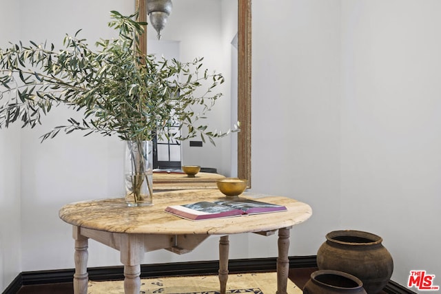 dining room with wood-type flooring