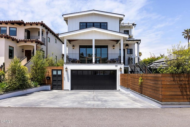 view of front of house with a garage and a balcony