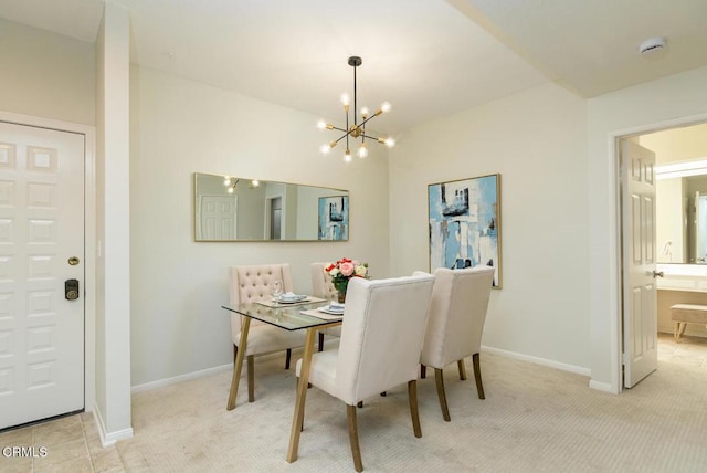 dining area with light colored carpet and an inviting chandelier