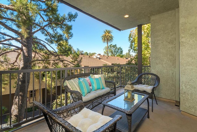 balcony with an outdoor hangout area