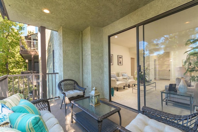 balcony with an outdoor hangout area