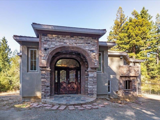 doorway to property with french doors