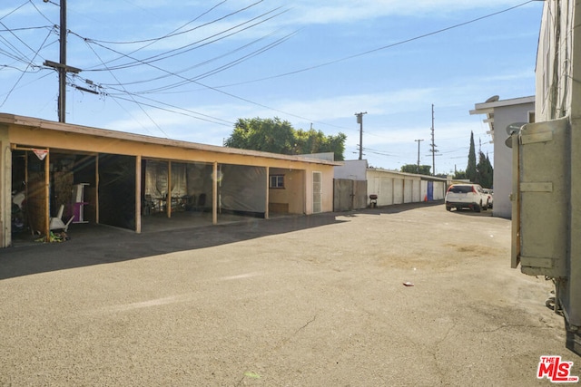 exterior space featuring a carport