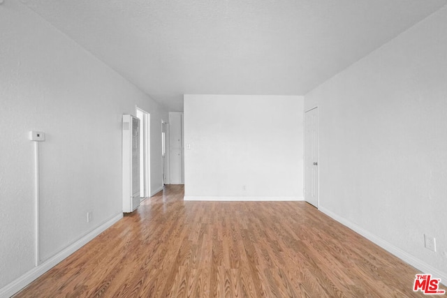 empty room featuring light hardwood / wood-style floors