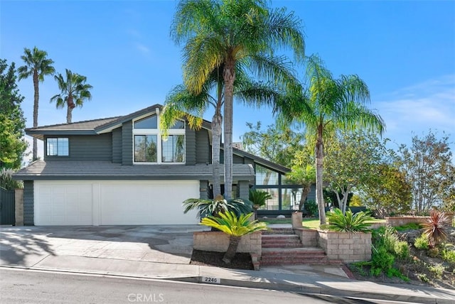 view of front of property with a garage