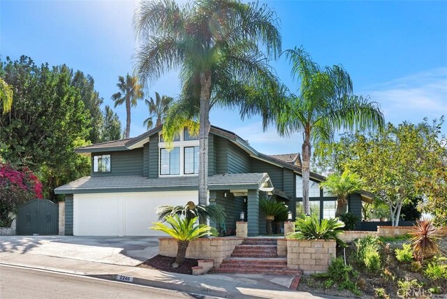 view of front of property with a garage