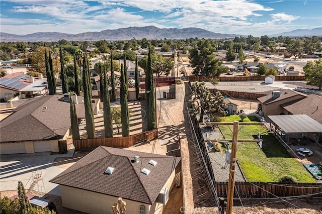 drone / aerial view featuring a mountain view