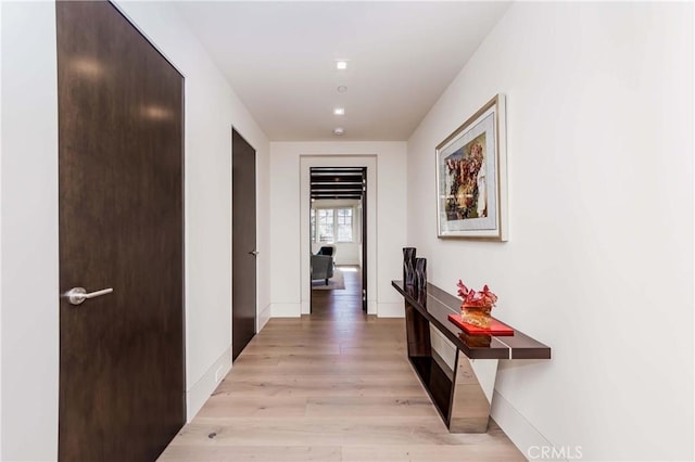 hallway featuring light hardwood / wood-style floors