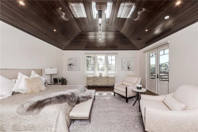 bedroom featuring access to exterior, vaulted ceiling, multiple windows, and wooden ceiling