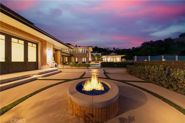 exterior space featuring a fire pit