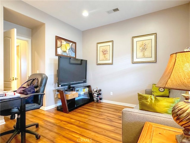 office space featuring light wood-type flooring