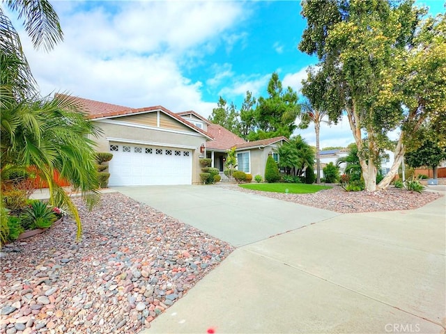 ranch-style house featuring a garage