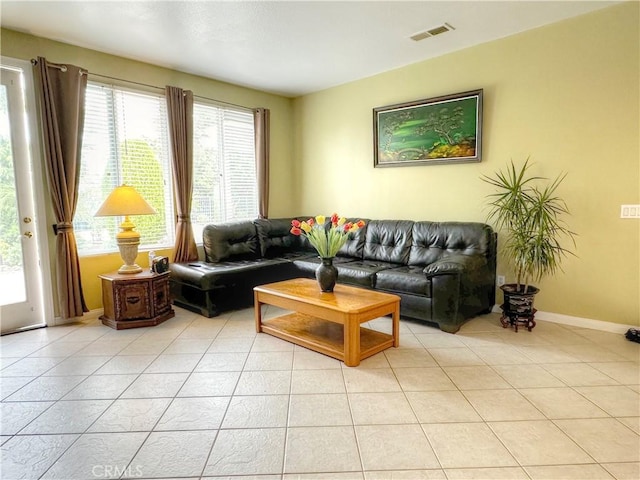 living room featuring light tile patterned flooring