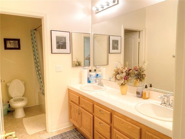 full bathroom featuring tile patterned flooring, vanity, toilet, and shower / tub combo with curtain