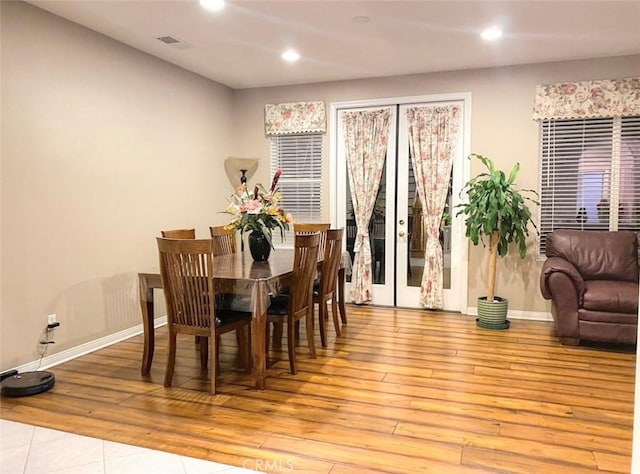 dining room featuring light wood-type flooring