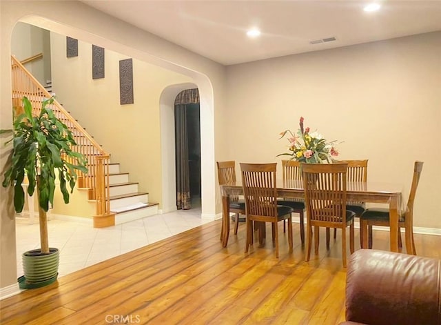 dining room with light hardwood / wood-style flooring