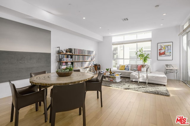 dining space featuring light hardwood / wood-style flooring